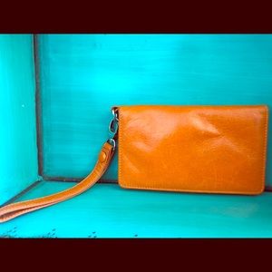 Hobo orange leather wristlet